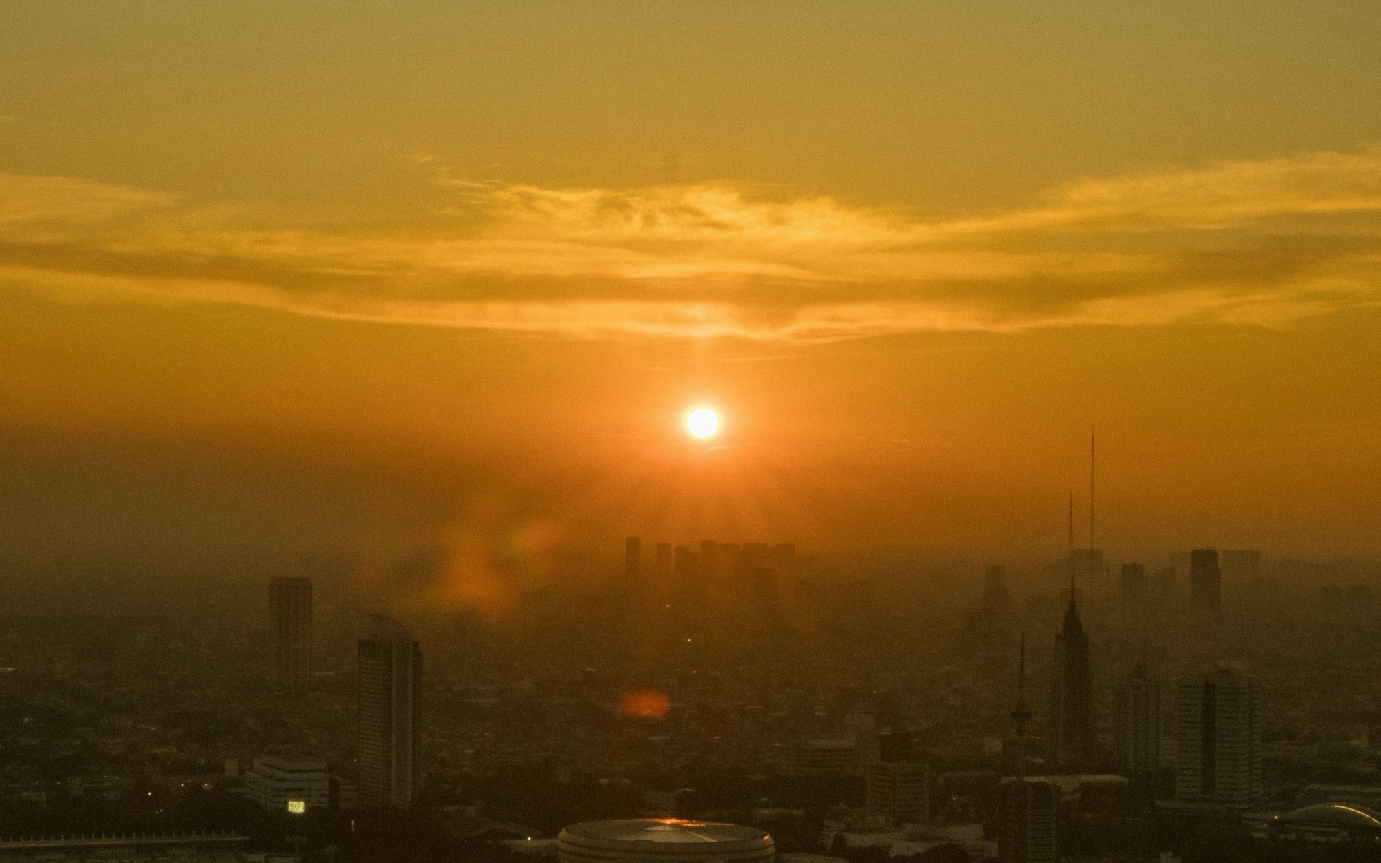 The sun setting over Jakarta